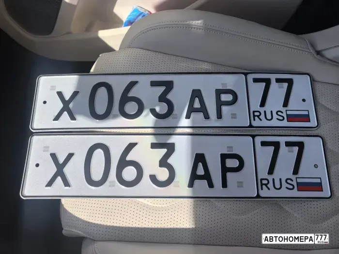 Номер Х063АР77 на автомобиле