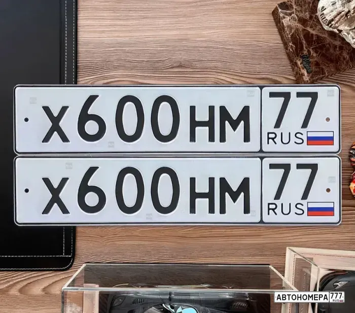 Номер Х600НМ77 на автомобиле