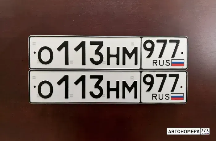 Номер О113НМ977 на автомобиле