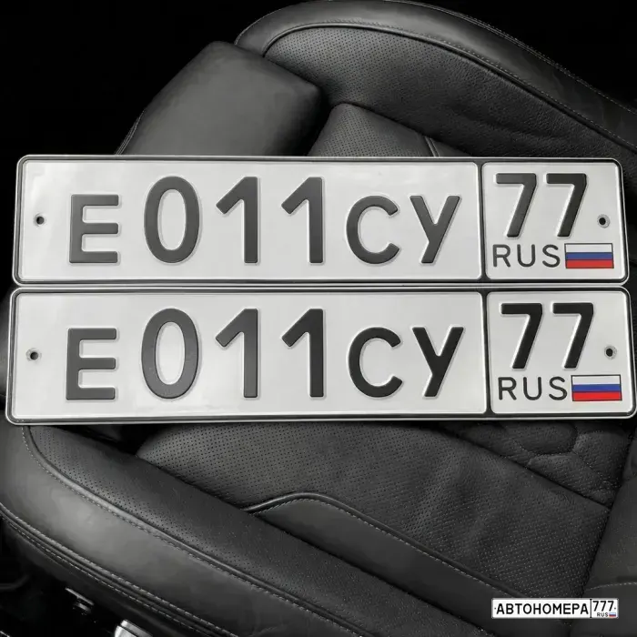 Номер Е011СУ77 на автомобиле